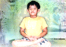 Published on 3/5/2001 A young Dafa disciple practice meditation.