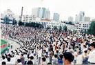 Published on 12/15/2003 Historical Photo: Morning group practice of 30,000 people in Harbin, Heilongjiang province, China