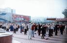 Published on 2/17/2004 Historic photos: In 1998, Falun Gong practitioners in Chongqing practice together on weekend to introduce Falun Dafa