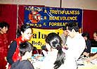 Published on 1/31/2001 Falun Gong booth is very interests people in Chinese New Year Festival in Texas