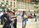 Published on 7/28/2000 At the one-year anniversary of persecution of Falun Gong by the Chinese government, Dafa practitioners in Switzerland held hongfa activities and exercise demonstration in the Federal Government Square of Bern, the capital of Switzerland. 
