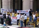 Published on 11/17/2000 Members of the Falun Gong spiritual group appealed to the Hong Kong government for help in tracing a member who disappeared after he filed a lawsuit against Chinese President Jiang Zemin.
