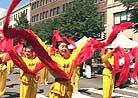 Published on 8/28/2002 Falun Gong Practitioners from Boston Attend the "Caribbean-Style Costume Parade" in the City of Cambridge