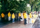 Published on 7/8/2001 In the rain, Practitioners in Ireland protest the Wanjia massacre in front of the Chinese embass