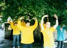Published on 7/8/2001 In the rain, Practitioners in Ireland protest the Wanjia massacre in front of the Chinese embass
