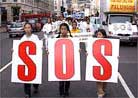 10/18/2001发表.法轮功及支持者伦敦大游行呼吁国际阻止中国国家恐怖主义蔓延