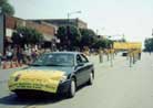 Published on 8/23/2000 Promote Dafa during Johnson County Fair Parade in Kansas