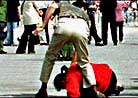 Published on 10/11/2000 Plainclothes police arrest peaceful practitioners appwaling on Tiananmen Square