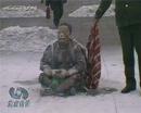 Published on 2/4/2001 Reader’s letter: Inconsistencies in the Self-Immolation Incident--Although Wang Jindong appears to have been blackened or burned by the fire, the sprite bottle that was alleged to hold gasoline remains intact between his legs. An officer standing behind Wang Jindong holds a fire blanket but doesnt immediately apply it.  