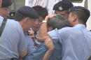 Published on 3/15/2002 Hong Kong Falun Gong practitioners issue clarification to the No. 4 Statement from Hong Kong police --photo evidence of Hong Kong police’s brutal actions on Falun Gong practitioners