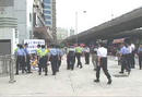 Published on 3/15/2002 China Liaison Office in Hong Kong pressures police to violently suppress and falsely charge 16 practitioners protesting Jiang’s order to "Kill Without Pardon"