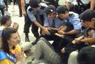 Published on 7/14/2002 Practitioners on Trial in Hong Kong -- Photos of the Arrest -- Who is Blocking Whom?
