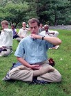 Published on 1/7/2002 Falun Gong practitioners sit in meditation during group practice in New York City, 2002.