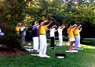 Published on 11/17/1999 Falun Dafa practitioners in North Carolina "Holding the Wheel" during group practice in Duke Park, 1999.