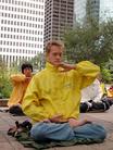 Published on 10/31/2002 Male Falun Dafa practitioner in Texas sits in meditation during peaceful protest against Jiang’s persecution of Falun Gong practitioners, Houston, October 2002.
