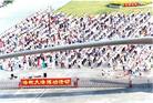 Published on 3/16/2004 Young Falun Dafa diciples participate in large-scale group practice at Shenzhen City Stadium, China, October 1998.
