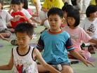 Published on 6/9/2004 Children learn to practice Falun Gong exercises during a one-day "Falun Dafa Camp" at Yunlin County Elementary School to introduce the practice to Pupils and Teachers, June 5, 2004.
