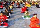 Published on 9/15/1998 Young Falun Dafa diciples practice Exercise Five during International Falun Dafa Cultivation Experience Sharing Conference in Beijing, 1998.