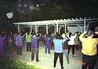 Published on 6/12/2002 Historical Photos: Miraculous Scenes During Morning Group Practice and Experience Sharing Conferences Prior to July 20, 1999: Photo taken during morning group practice at Heping practice site, Taiping District, Harbin City, Heilongjiang Province, around 4:50 a.m., the sky was clear. (September 22, 1998)