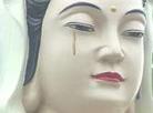 Published on 1/18/2003 Taiwan Eastern Today reported on January 17, 2003: a statue of Bodhisattva Avalokitesvara in Kaohsiung City had something like tear stains below her right eye about one month ago. They remain even after it was rained on several times.

Below the right eye of the statue of Bodhisattva Avalokitesvara, there is a dark red line like tear stains. From a distance, it appears as if a tear is falling from her eye. Tsung Zongjian, Director of South Star Planning Area Management Center, said that over a month ago something strange on the face of the statue was found and immediately everyone felt uneasy.

Over the past month, the tear stains on the face of the statue have not been washed away by rain, nor have they faded. Management personnel don’t know why such a strange thing has happened and don’t dare to wash them away. 