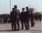 Published on 11/3/2000 Plain-cloth policemen after beating practitioners