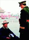 Published on 8/20/2000 An old man was sit on the Tiananmen Square to had a rest, a police stopped by him and asked if he was a Falun Gong Practitioner.