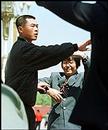 Published on 4/27/2000 BBC:法轮功成员在天安门广场练功被保安人员带走
