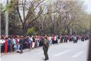 Published on 4/20/2001 Falun Gong practitioners waiting quietly for a just decision by Central Government officials on April 25, 1999. Police led the practitioners to Fuyou Street near Zhongnaihai, the government compound. 
