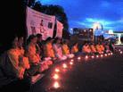 Published on 6/24/2003 Sweden, Gothenburg Falun Gong Practitioners Holding a Candlelight Vigil in Front of the Chinese Consulate on June 21, 2003 to Support the Lawsuit Against Jiang and Also Commemorate Fellow Practitioners Who Have Lost Their Lives in the Persecution