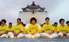 Published on 7/19/2004 On the afternoon of July 17, 2004, several thousand Falun Gong practitioners gathered on the Chanyang Avenue in front of the Chiang Kai-Shek Memorial Hall and held "July 20" anti-persecution activities to call upon people from all walks of life to pay attention to the 5-five-year ruthless persecution suffered by Falun Gong practitioners in China.