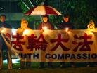 Published on 7/27/2004 On July 23 it is winter in Australia, and it was rainy and windy in Melbourne. At 7 pm, Falun Gong practitioners gathered in front of the Chinese Consulate in Melbourne to participate in the global activity to "light a candle to commemorate the unyielding practitioners who died upholding conscience.