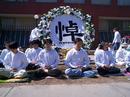 Published on 4/7/2001 April 5th is the traditional Chinese Memorial Day for dead people. It is the date that people mourn their families, or heroes who have passed away. On this unusual day, over 120 Falun Dafa practitioners in Toronto gathered in front of the Toronto Chinese Consulate, and expressed sorrowful grief over the 181 Falun Dafa practitioners who have lost their lives, in steadfast and determined belief in "Zhen-Shan-Ren" (Truthfulness-Compassion-Tolerance). Wearing white clothing, Toronto practitioners quietly practiced the meditation exercise, accompanied by the Falun Dafa music of Pudu and Jishi.