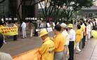 Published on 7/23/2004 July 20, 2004 marked five years of persecution of Falun Gong in China. Korean Falun Gong practitioners held activities in front of the Chinese Embassy and Consulate from 1pm to 3pm, to strongly condemn the persecution of Falun Gong by Jiang’s regime. They read a statement of mourning in memory of persecution victims, introduced Falun Dafa and its history and held a press conference.