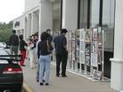 Published on 10/23/2002 On October 19 and 20,2002,Dallas Falun Gong practitioners held a photo display in front of a Chinese supermarket in Dallas,Texas.