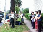 Published on 10/9/2002 On October 7, 2002 between 12pm and 1pm, Falun Gong practitioners held a press conference in front of the Chinese Consulate in Houston for the Global Rescue of the Family Members of Falun Gong Practitioners.