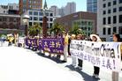 Published on 7/12/2004 On July 11, several groups including Falun Gong practitioners in the Bay area and the "Grand Global Coalition against the Chinese Party’s Extension of State-run Terrorism" held a rally and parade to raise awareness of the fact that members of Jiang’s political group hired gunmen to shoot Falun Gong practitioners in South Africa.