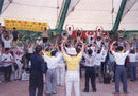 Published on 5/15/2002 Falun Gong practitioners taught exercises to more than 300 volunteers, students and parents from Friends of Chunhui (Spring’s Sunrays) in Taiwan.  