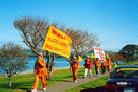 Published on 10/9/2001 Practitioners marching as they arrive in Wellington, New Zealand as part of the SOS! Global Rescue Walk in October 2001.
