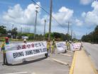 Published on 7/21/2003 Falun Gong Practitioners in Saipan circle the island on foot to clarify the truth on the fourth anniversary of the persecution, July 2003.