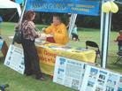 Published on 7/4/2002 On 6/29/02, middle England Dafa practitioners participated in the Numilts Folk Peace Art Festival. They demonstrated the exquisite exercises of Falun Gong, clarified the truth with pictures, and exposed the Chinese Jiang Zemin group to Falun Gong’s persecution.  People were shocked. 