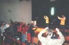 Published on 1/27/2002 A practitioner in city of Netanya is a teacher of a high school. He decided to bring Falun Dafa to the school and let students benefit from it.
Photo taken while teaching the exercises shows miraculous lights 