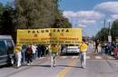Falun Gong practitioners in Missouri participate in the annual University of Missouri homecoming parade (October 2000)