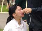 Published on 6/28/2004 The tortures suffered by practitioners shocked spectators. They asked for truth-clarifying materials, and signed the petition urging the Chinese government to stop the persecution of Falun Gong.