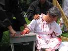 Published on 8/3/2004 Boston Dafa practitioners hold an anti-torture exhibition to unfold thoroughly the brutal persecution of Falun Gong in China.