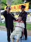 台湾台南法轮功学员举办南非枪击案记者会及酷刑展， 强烈谴责江氏集团的暴行 2004-08-01