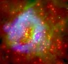 A Young Galaxy Forming at 6000 Light-Years to Earth 