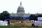 Published on 6/30/2003 On June 28,2003, people from across the US held a public rally at the National Mall in Washington DC to request the Hong Kong government to abolish Article 23 legislation, and to support the July 1st Grand March Against Article 23 Legislation in Hong Kong.
