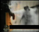 2001年1月23日下午的“天安门自焚”录像分析： 自焚者刘春玲是被身后警察手持重物击打致死
