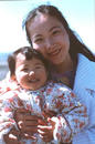 Published on 12/8/2001 UK practitioner Mo Zhengfang with her daughter Minghui, who was denied a passport by the Chinese Embassy, 2001.
