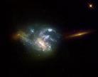 Published on 8/3/2002 NASA released an image of a galaxy, NGC 7673, photographed by Hubble Space Telescope. The bright blue light in the image showed that the galaxy is ablaze with light from millions of immense new stars. Each of its infant giant star clusters shines 100 times brighter in the ultraviolet spectrum as similar immense star clusters in our own Milky Way galaxy.